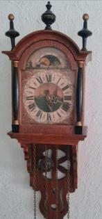 Antieke Friese klok schippertje, Ophalen