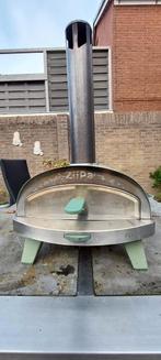 Ziipa pizza-oven, Ophalen, Gebruikt