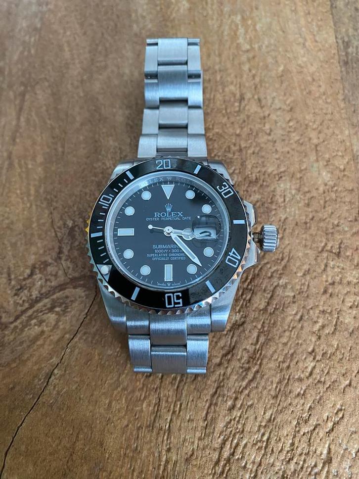 Rolex submariner met date en (klein) defect, Sieraden, Tassen en Uiterlijk, Horloges | Antiek, Polshorloge, Overige merken, Staal