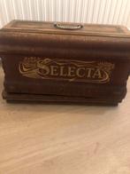 Antiek naaimachine, Ophalen