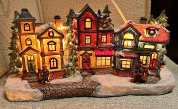Kerstdorp met verlichting (zo’n 34 cm breed) beschikbaar voor biedingen