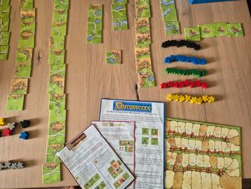 Carcassonne met De uitbreiding en Kooplieden & Bouwmeesters beschikbaar voor biedingen