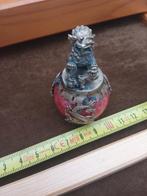 Tempelleeuw op steen, Ophalen