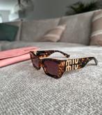 Miu miu zonnebril, Sieraden, Tassen en Uiterlijk, Zonnebrillen en Brillen | Dames, Overige merken, Zonnebril, Bruin, Nieuw