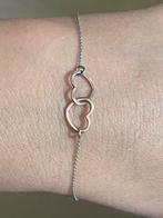 Zilveren armbandje met 2 goudkleurige hartjes ineen gestreng, Ophalen of Verzenden, Zo goed als nieuw, Zilver