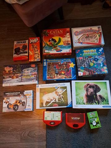 Diversen bordspellen en puzzels beschikbaar voor biedingen