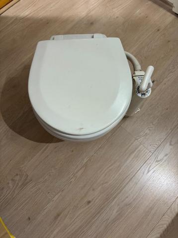 Toilet Handbediend beschikbaar voor biedingen