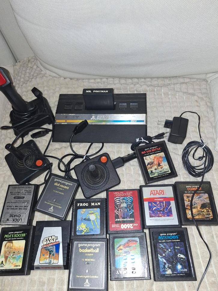 Atari 2600 met games en controllers, Spelcomputers en Games, Spelcomputers | Atari, Gebruikt, Atari 2600, Met 2 controllers, Met games