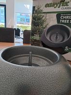 Kerstboomstandaard, Ophalen