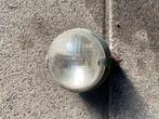 Koplamp van een oldtimer tractor, Ophalen, Gebruikt