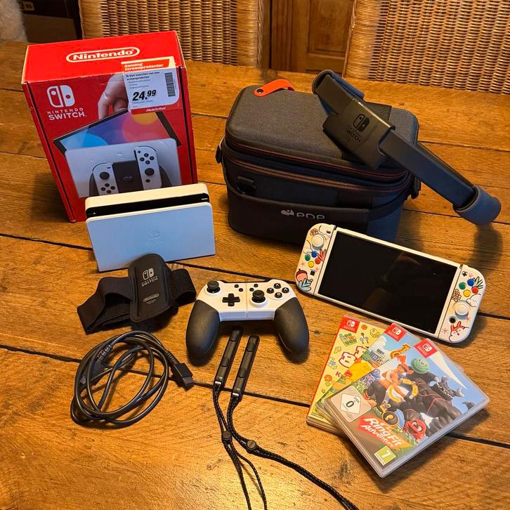 Nintendo Switch OLED + Games & Accessoires, Spelcomputers en Games, Spelcomputers | Nintendo Switch, Zo goed als nieuw, Switch OLED