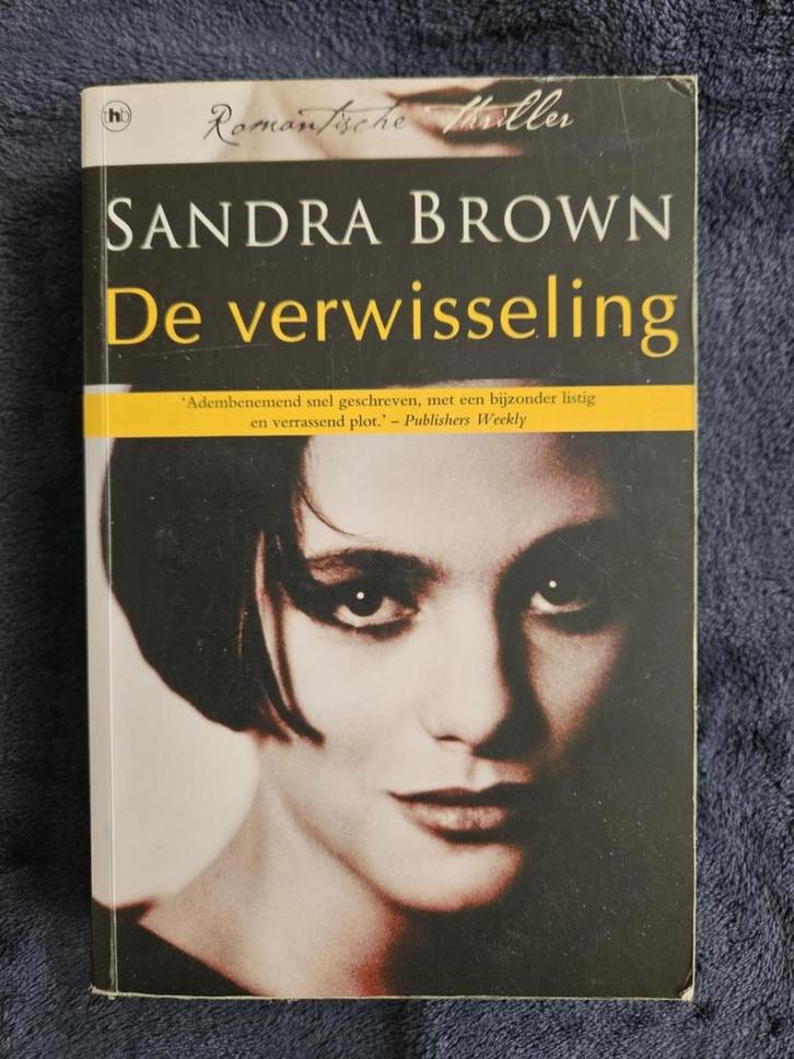 Sandra Brown - De verwisseling, Boeken, Thrillers, Gelezen, Ophalen of Verzenden