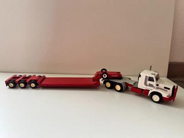 Volvo NL12 met dieplader van Conrad beschikbaar voor biedingen
