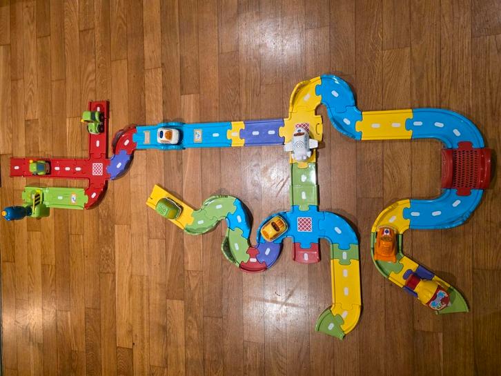 Toettoet auto's met veel baanstukken!, Kinderen en Baby's, Speelgoed | Vtech, Gebruikt, Ophalen of Verzenden
