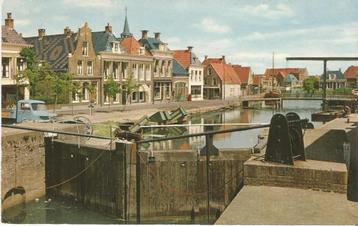 Makkum sluis brug woningen 1966 beschikbaar voor biedingen