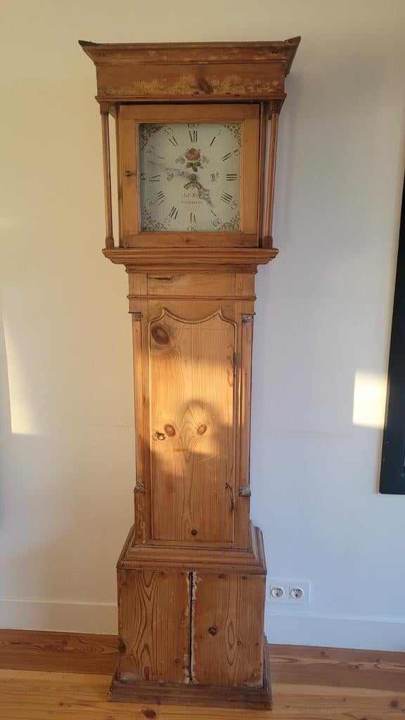 Antieke grenen klok, Ophalen