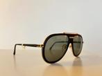 Vintage jaren 80 design zonnebril Nikon, Sieraden, Tassen en Uiterlijk, Verzenden, Zo goed als nieuw, Overige merken