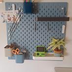 Skadis prikbord, Ophalen