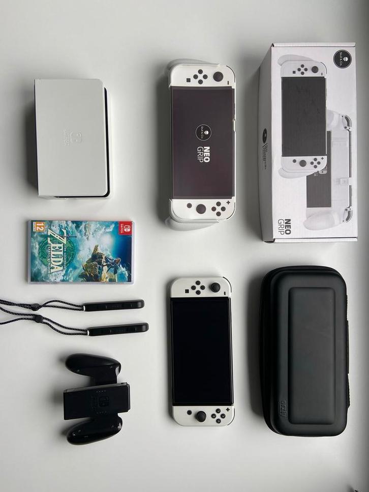 Nintendo Switch OLED + Zelda, It Takes Two, Grip, Spelcomputers en Games, Games | Nintendo Switch, Gebruikt, Avontuur en Actie
