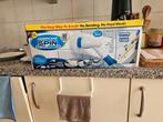 Spin scrubber voor de badkamer., Ophalen