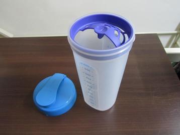 Diverse nieuwe blauwe , roze en paarse Tupperware beschikbaar voor biedingen