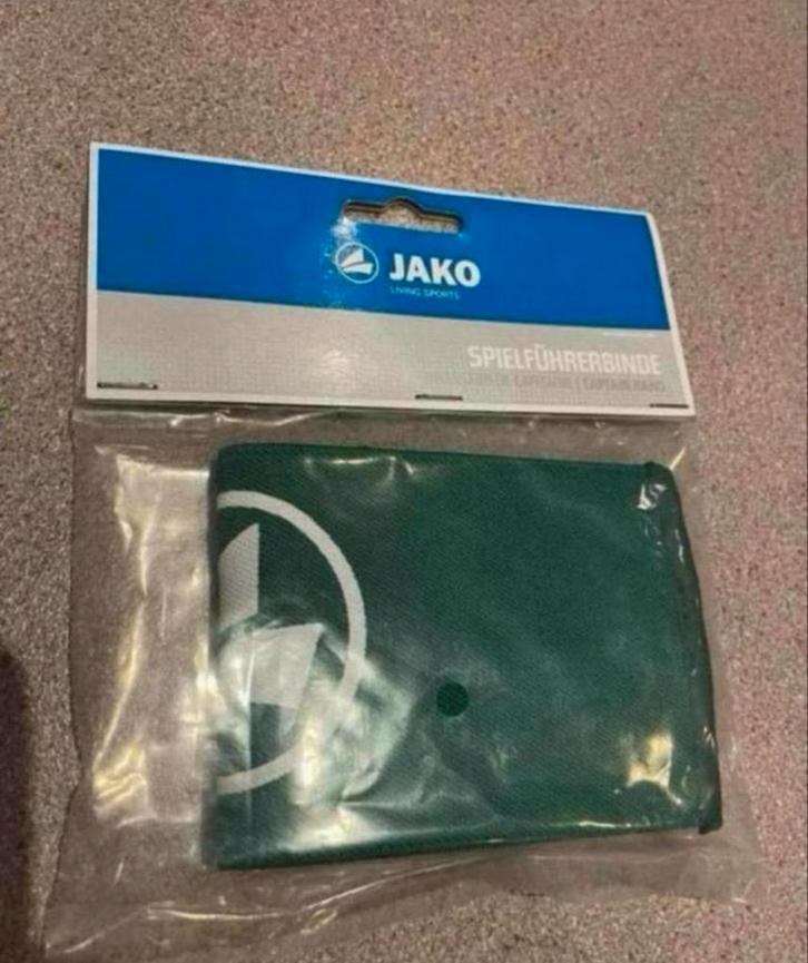 Jako groene captain band, Verzamelen, Sportartikelen en Voetbal, Zo goed als nieuw, Overige sporten, Ophalen of Verzenden