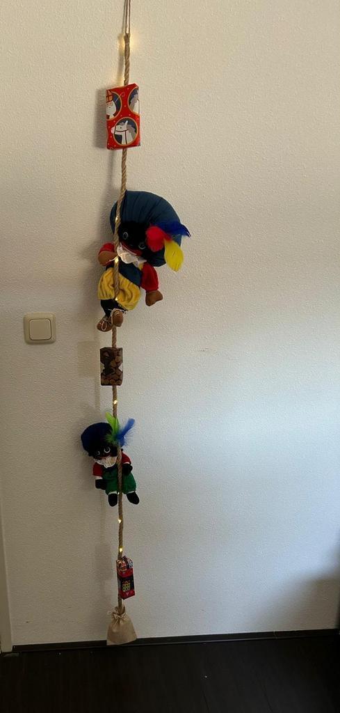 Zwarte pietjes in touw met verlichting, Diversen, Sinterklaas, Gebruikt, Ophalen of Verzenden