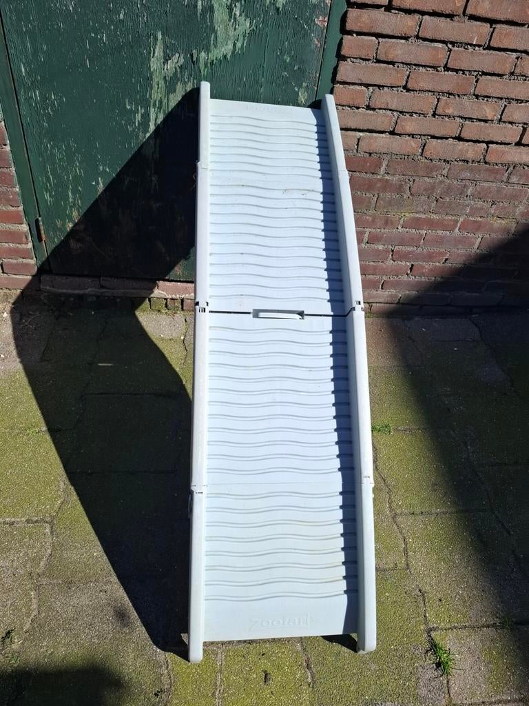 Inklapbare honden loopplank, Ophalen