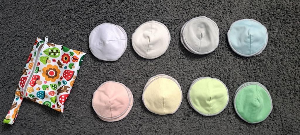 Herbruikbare zoogcompressen met wetbag, Kinderen en Baby's, Babykleding | Overige, Ophalen of Verzenden, Zo goed als nieuw, Onbekend