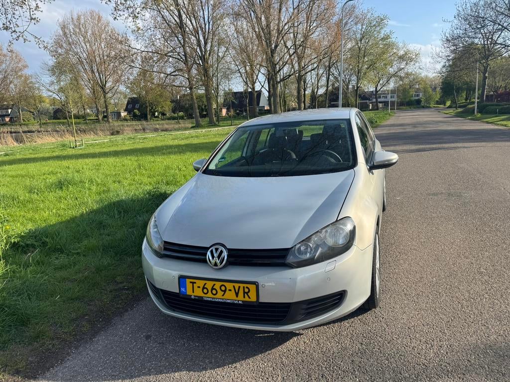 Volkswagen Golf 1.2 TSI 77KW 2010 Grijs, Auto's, Volkswagen, Voorwielaandrijving, Stof, Zwart, 4 cilinders
