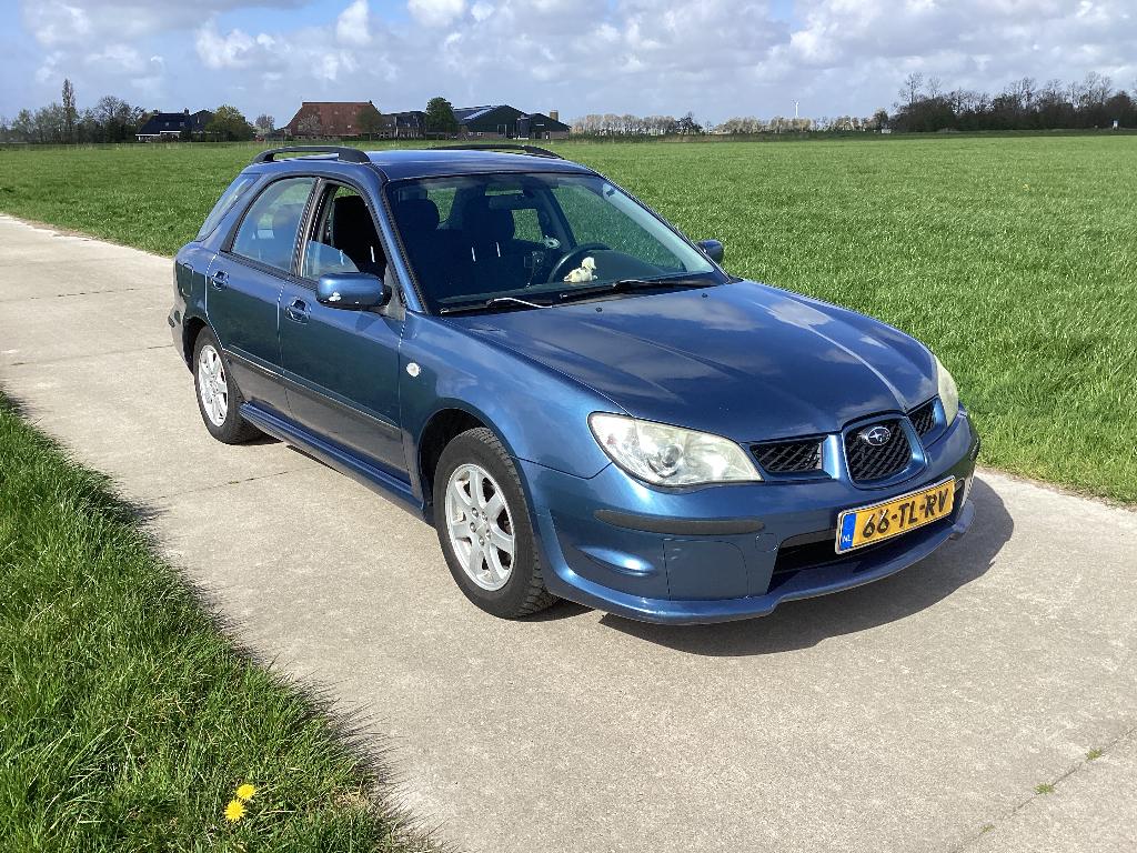 Subaru Impreza 1.5 Plus AWD 2006 Blauw, Auto's, Subaru, 13 km/l, Stof, 1498 cc, Zwart