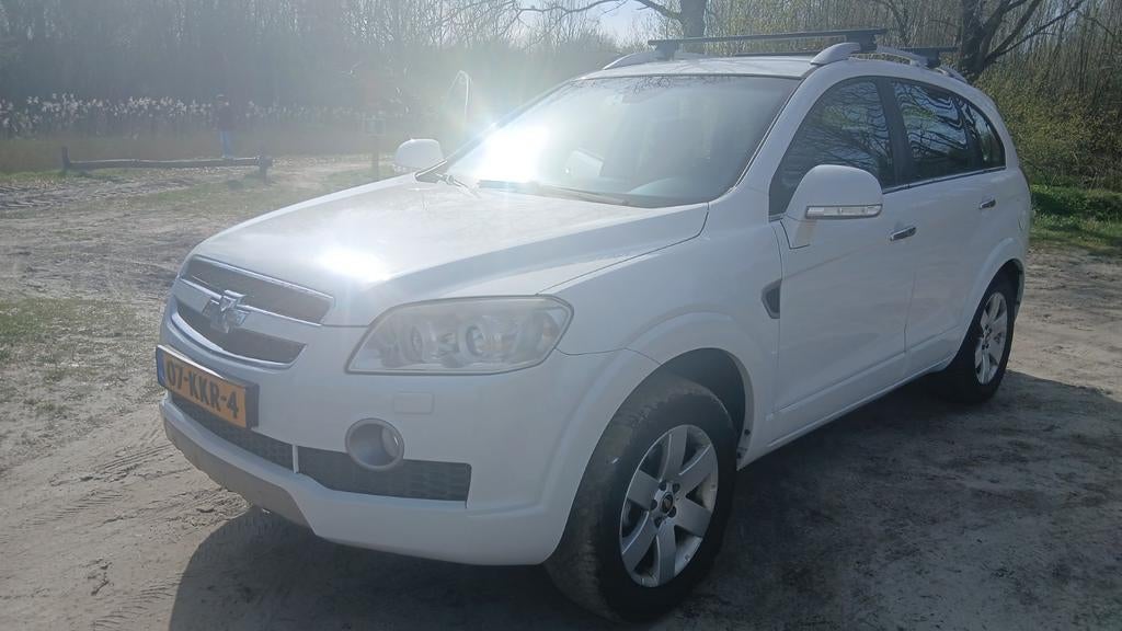 Chevrolet Captiva 2.4 4WD 2009 parelmoer wit Nieuwe Apk, 136 pk, Zwart, 4 cilinders, 7 stoelen