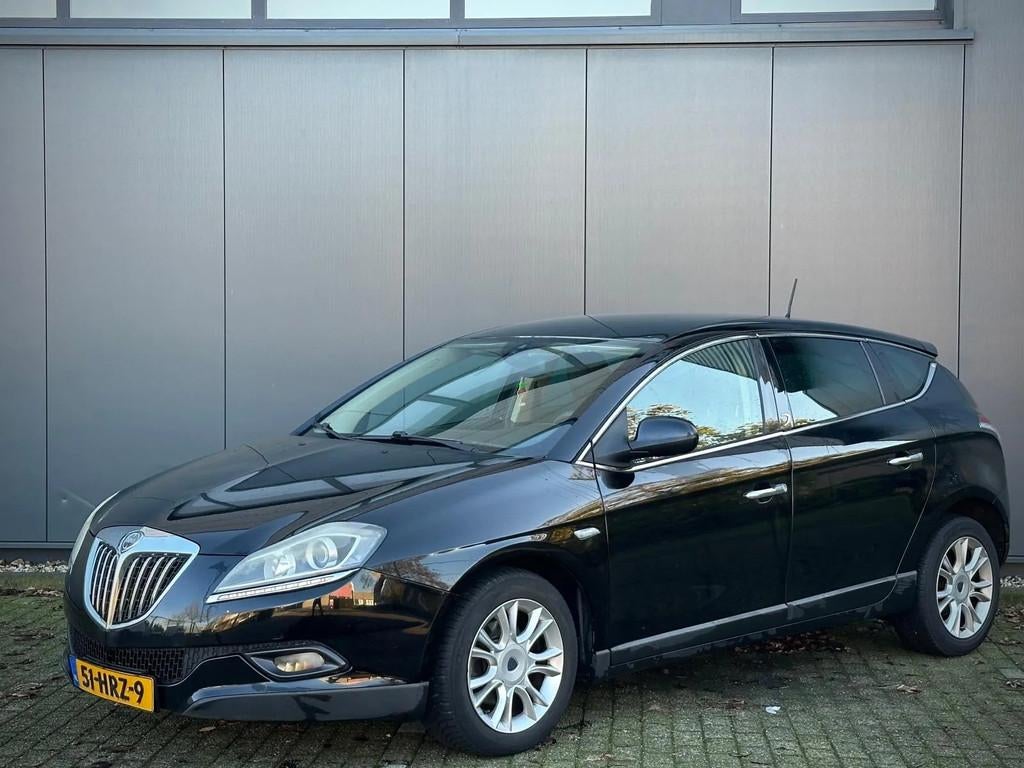 Lancia Delta 1.4 T-Jet 16V Oro | Nap | Clima, Auto's, Lancia, Gebruikt, 4 cilinders, Zwart, Origineel Nederlands
