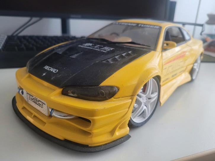 Nissan rally 1/¹2, Hobby en Vrije tijd, Modelauto's | 1:5 tot 1:12, Zo goed als nieuw, Auto, 1:9 t/m 1:12, Ophalen of Verzenden