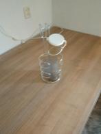 Urinaal met houder, Ophalen