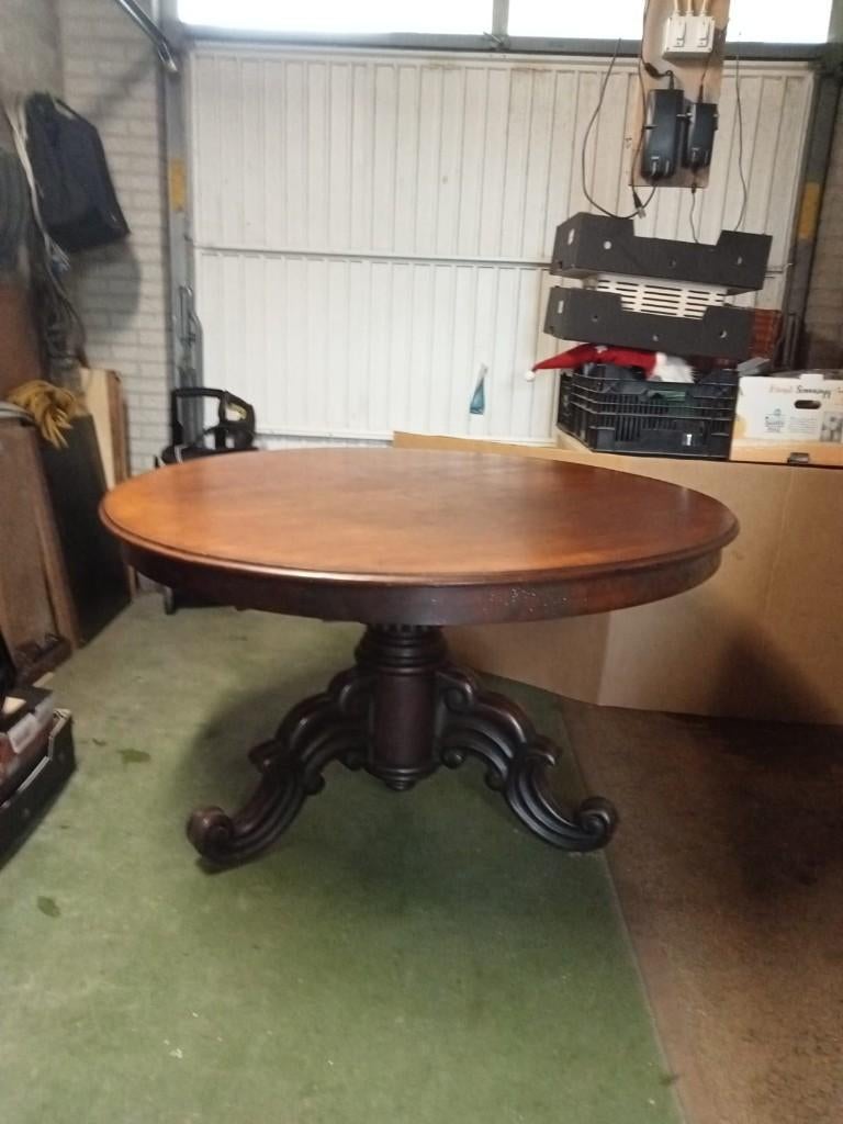 Antieke ronde eettafel, Ophalen