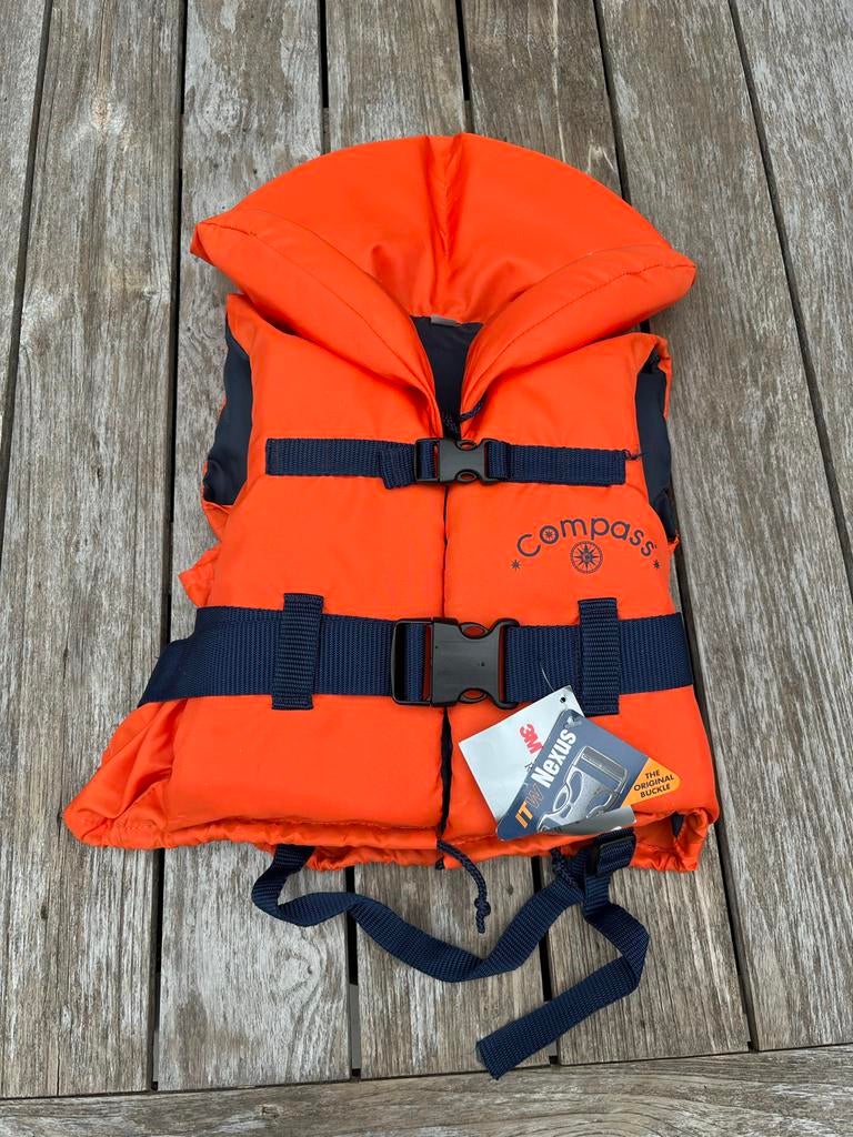 Zwemvest Compass XS 10-20kg - Oranje, Watersport en Boten, Watersportkleding, Ophalen of Verzenden, Nieuw, Kind, Reddingsvest of Zwemvest