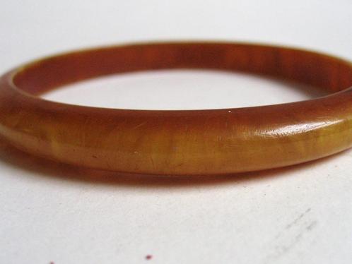 Vintage bakeliet barnsteen armband jaren 40, Sieraden, Tassen en Uiterlijk, Antieke sieraden, Armband, Overige materialen, Ophalen of Verzenden