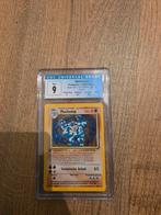 Machamp 1st Edition CGC 9, Hobby en Vrije tijd, Verzamelkaartspellen | Pokémon, Ophalen of Verzenden, Zo goed als nieuw, Losse kaart