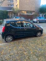 Nissan Pixo 1.0 50KW 5D 2010 Zwart, Voorwielaandrijving, Stof, 200 kg, 4 stoelen