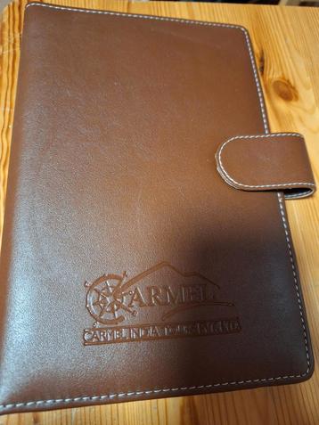 Leren bruine map beschikbaar voor biedingen