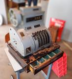 Oude kassa en typemachine, Ophalen