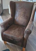 Bruine fauteuil met oren, Ophalen
