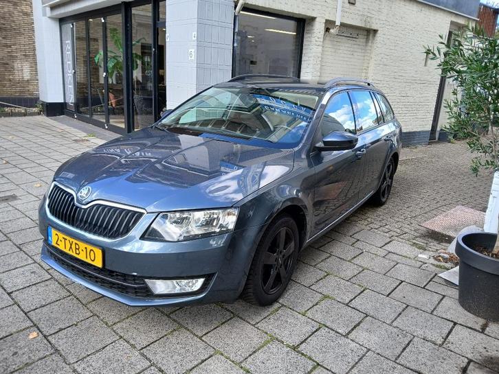 Skoda Octavia 1.2 TSI 77KW Combi 2014 Grijs, Auto's, Skoda, Bedrijf, Octavia, Benzine, A, Hatchback, Handgeschakeld, Origineel Nederlands