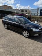 Skoda Octavia 1.4 TSI Combi AUT 2009 Zwart, Auto's, Skoda, Euro 5, Beige, 4 cilinders, Parkeersensor