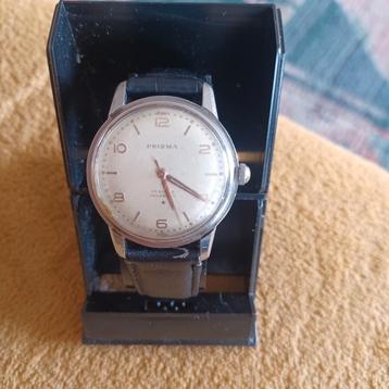 Prisma vintage horloge beschikbaar voor biedingen