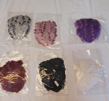 Nieuwe heel mooie veren kapjes of pads voor in het haar (A) beschikbaar voor biedingen