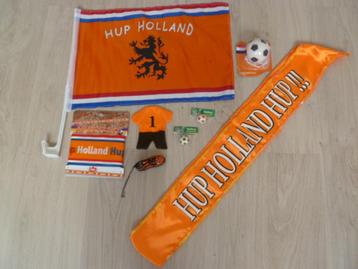 Diverse kleine oranje artikelen. Nieuw. (Voetbal supporter?) beschikbaar voor biedingen
