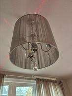 Zilver kroonluchter met grijze kap, Ophalen