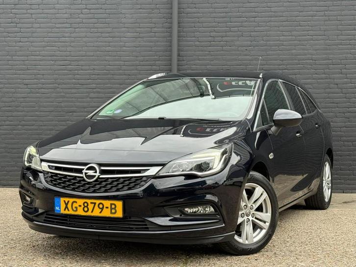 Opel Astra Sports Tourer 1.0 Turbo Online Edition PDC | 1STE, Auto's, Opel, Bedrijf, Te koop, Astra, ABS, Airbags, Airconditioning
